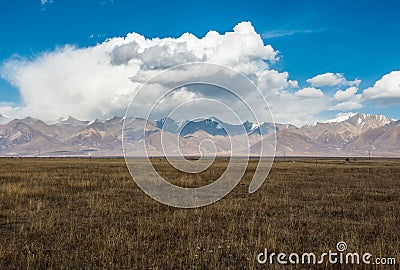 Incredible color of the sky and clouds over flat Tibetan plain Stock Photo