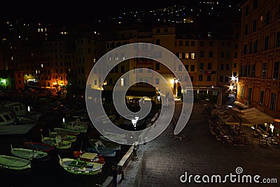 Incredible night view of the seaside town of Camogli with lights, colors and reflections in a magical atmosphere Editorial Stock Photo