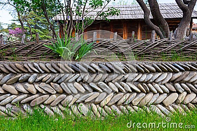 An incredible traditional Georgian stone fence made of river stones Stock Photo