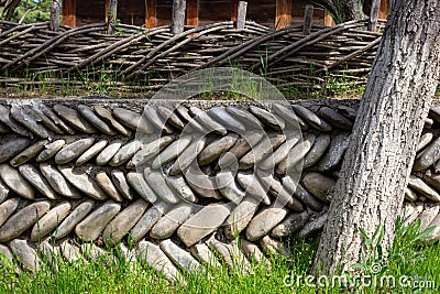 An incredible traditional Georgian stone fence made of river stones Stock Photo