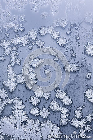 incredibly beautiful patterns are drawn by a frost on the windows of houses Stock Photo