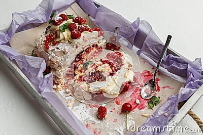 Incredibly delicious dessert in the form of meringue cake on a wooden tray for breakfast Stock Photo