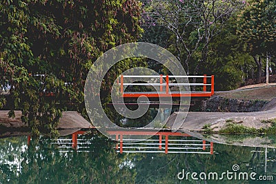 Small orange bridge in the Ecological Park, in Indaiatuba, Brazil Stock Photo