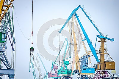 Indastrial crane in cargo port at winter Stock Photo