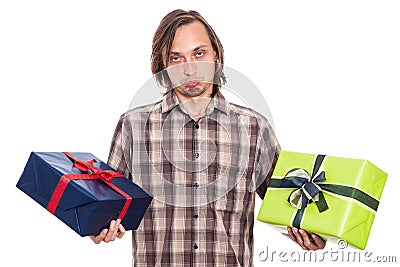 Indecisive man with two gifts Stock Photo