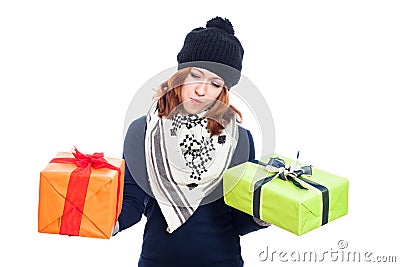 Indecisive woman with presents Stock Photo