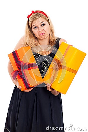 Indecisive woman with two gifts Stock Photo
