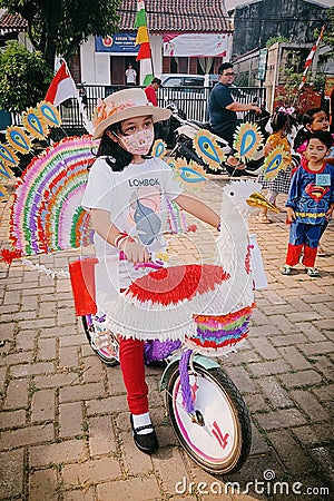 independence day celebration, kids cycling theme competition, jakarta, indonesia independence day, culture, jakarta, indonesia Editorial Stock Photo