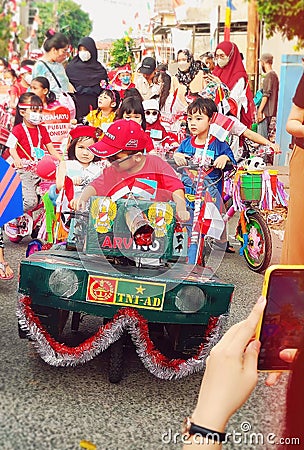 independence day celebration, kids cycling theme competition, jakarta, indonesia independence day, culture, jakarta, indonesia Editorial Stock Photo