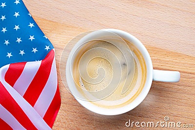 Independence Day USA concept. Memorial Day. Cup of coffee with American flag on white background top view Stock Photo