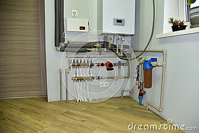 Independent heating system in boiler room at home. Domestic water supply system. Water supply for underfloor heating. Rainwater Stock Photo