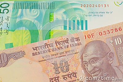 India, Indian, New Delhi, rupee, orange, ten, Ocean, INR, money, currency, mint, mints, change, small, monies, currencies, close, Stock Photo