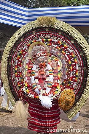 INDIA, KERALA, KANNUR, TRIKARIPUR, 18th April 2018, Man dressed in Adoor Chamund for Theyyattam. Editorial Stock Photo