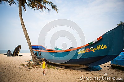 Fishing boat of Indian fishermen on the sandy beach in Kerala, fishing village Marari Editorial Stock Photo