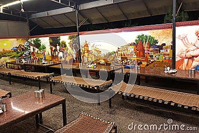 India open restaurant interior with traditional sitting arrangement - Image Editorial Stock Photo