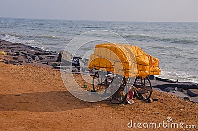 India, Puducherry, mobile stall wagon by the sea Stock Photo