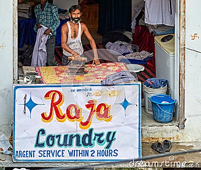 India Rajasthan Bundi. Ironing clothes Editorial Stock Photo