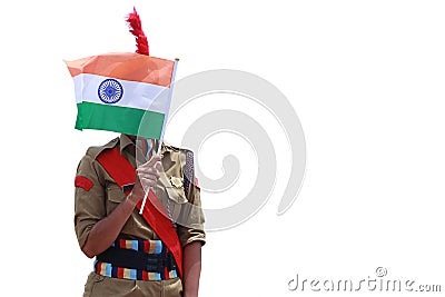 India`s National Cadet Corps NCC Lady Cadet Standing With Indian Flag, Stock Photo