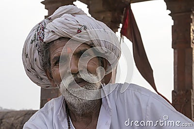 India - Varanasi. A holy man, sadhu looking into the camera. Editorial Stock Photo