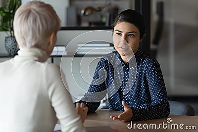Indian applicant and caucasian HR manager communication during job interview Stock Photo