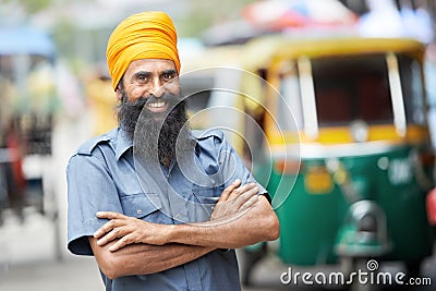 Indian auto rickshaw tut-tuk driver man Stock Photo