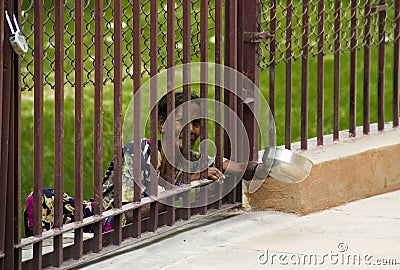 Indian beggar in Dhamek Stupa Editorial Stock Photo