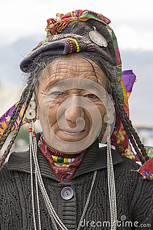 Indian beggar woman on the street in Leh, Ladakh. India Editorial Stock Photo