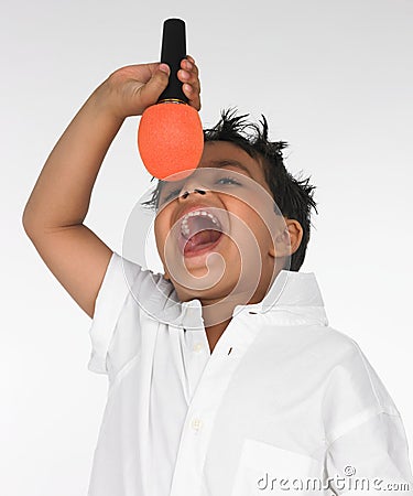 Indian boy singing song Stock Photo