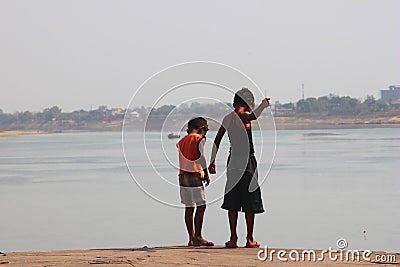 Indian Boys Fishing Editorial Stock Photo