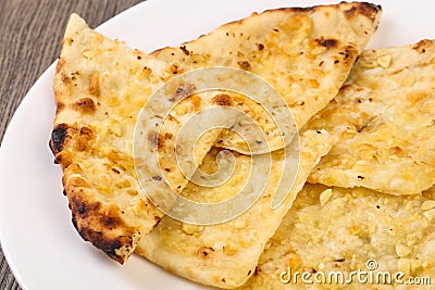 Naan with cheese and garlic Stock Photo