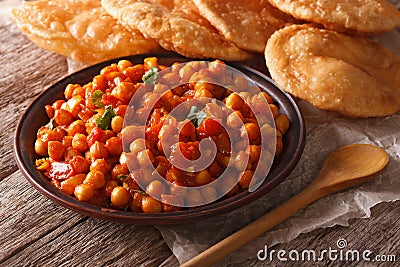 Indian Chana masala and puri bread close-up. horizontal Stock Photo