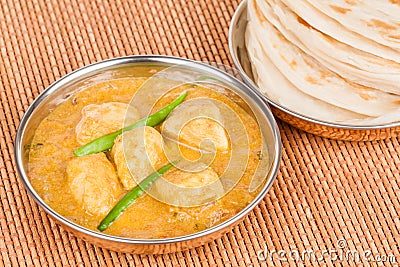 Indian Chicken Curry with Parotta Stock Photo