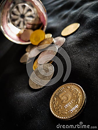 INDIAN COINS IN BLACK BACKGROUND Stock Photo