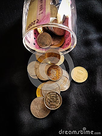 INDIAN COINS IN BLACK BACKGROUND Stock Photo