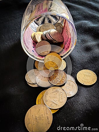 INDIAN COINS IN BLACK BACKGROUND Stock Photo