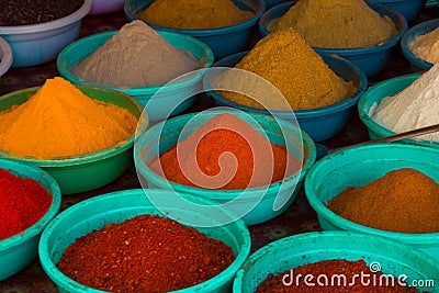 Indian colored powder spices in Arambol, North Goa, India Editorial Stock Photo