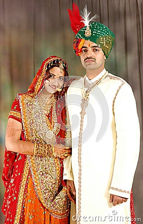 Indian couple in wedding attire Stock Photo