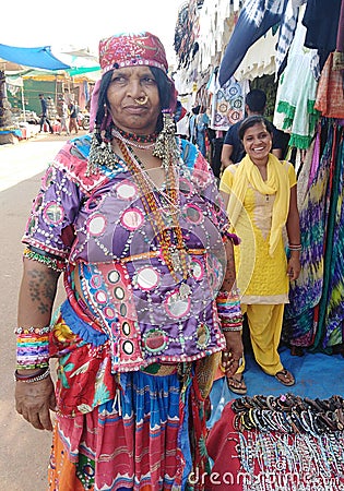 Gypsy woman on Wednesday Anjuna Flea Market. India, Goa Editorial Stock Photo