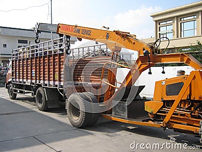 Indian crane and truck loading machine Editorial Stock Photo