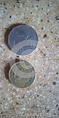 The Indian currency consists of Rupee 2 and Rupee 5 coins Stock Photo