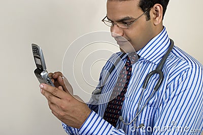 Indian Doctor talking urgent call Stock Photo