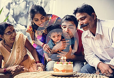 Indian family celebrating a birthday party Stock Photo