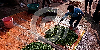 An indian farmer arranging vegetable at street shop Editorial Stock Photo