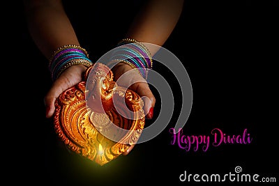 Indian Festival diwali , Lamp in hand Stock Photo