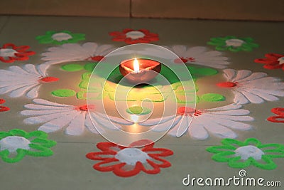 Indian festival diwali vibes with glowing diya and rangoli Stock Photo