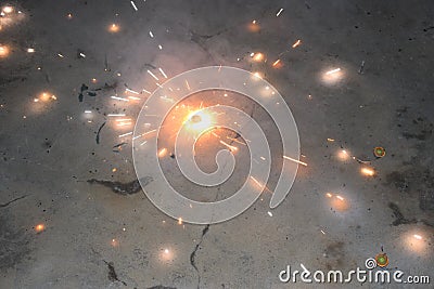 Indian Festival of Lights, Happy Diwali Celebration with illustration of exploding Firecracker on floral chakra Stock Photo