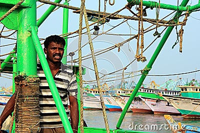Indian fisherman on his boat in Kanyakumari, India Editorial Stock Photo