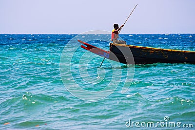 Indian fisherman on his boat in the sea Editorial Stock Photo