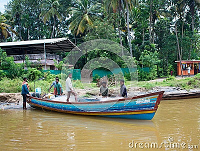 Indian fishmen in Kerala backwaters Editorial Stock Photo