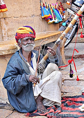 Indian folk artist playing ravanahatha violin at Jaisalmer fort Editorial Stock Photo